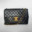 Ontdek de Tijdloze Elegantie van Designer Vintage Tassen